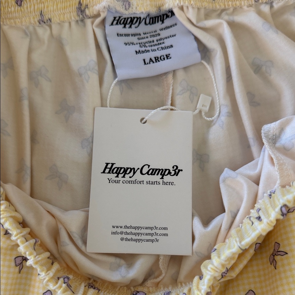 Yellow Shorts with Purple Bow Design - Picture 2 of 2